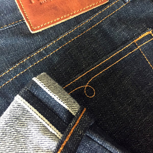 slim_raw_selvage_denim_jeans_hem-pocket_detail